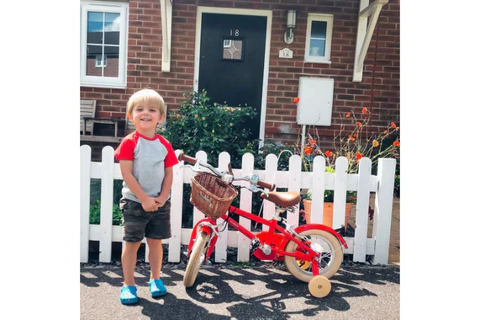 yellow strider bike